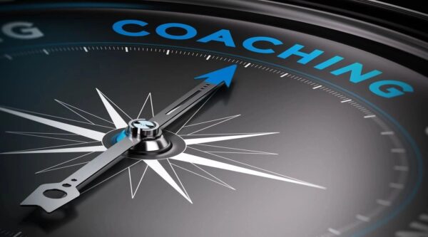 Compass pointing towards the word “Coaching”